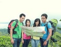 Hikers Looking The Map In Countryside Royalty Free Stock Photo