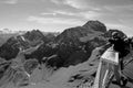 Hikers looking from Piz Nair to Julier mountains in the upper Engadin