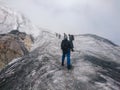 Hikers in the Margherita Glacier, Rwenzori Mountains, Uganda