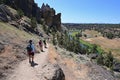 Hikers on Misery Ridge Trail in Smith Rock State Park, Oregon. Royalty Free Stock Photo