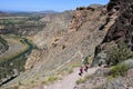 Hikers on Misery Ridge Trail in Smith Rock State Park, Oregon. Royalty Free Stock Photo