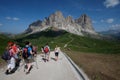 Group of hikers walking in the mountains. Dolomites Alps Trentino Alto Adige Italy Royalty Free Stock Photo