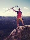 Male carrier with backpack and camping on hike in nature