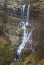 Hikers observing waterfall in the Urbasa Andia Natural Park