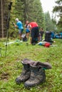 Hikers packs their backpack