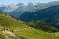 Hikers in path of Pic du Midi Ossau in French Pyrenees mountains