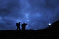 Hikers prepare to ascend Scafell Pike at night Royalty Free Stock Photo