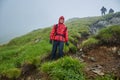 Hikers in raincoats on mountain Royalty Free Stock Photo