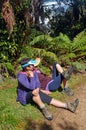 Hikers rest at The Side of Heaphy Track, New Zealand