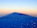 Hikers on the ridge ascend mount kilimanjaro the tallest peak in africa looking across at mt meru in the distance Royalty Free Stock Photo