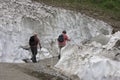 Hikers between snow, Koednitz Valley, Austria