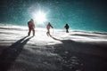 Hikers and snowfall in winter mountains, carpathia