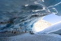 Hikers with snowshoes in Zinal glacier cave in Switzerland Royalty Free Stock Photo