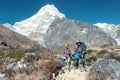 Hikers staying on Footpath in high Mountains