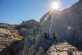 Hikers summit to Annie Peak, Pyrenees, France