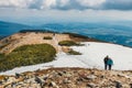 Hikers travel in the Babia Gora Mountain with a backpack