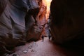 Hikers Under Buckskin Gulch Glow