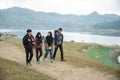 Hikers walking enjoy lake view