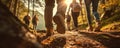 Hikers walking in fores in sunset light. Detail on hiker shoe rear view. copy space for text