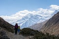 Hikers walking on the trail in Nepal, on Annapurna Circuit