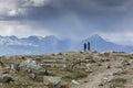 Hikers Watching an Approaching Storm - Jasper National Park, Can