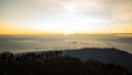 Hikers watching sunrise at the viewpoint of Mount Rinjani Royalty Free Stock Photo