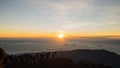 Hikers watching sunrise at the viewpoint of Mount Rinjani Royalty Free Stock Photo