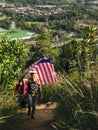 Hikers on the way to the peak of Janggut Hill. Royalty Free Stock Photo