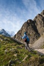 Hikier is climbing mountain in Caucasus Royalty Free Stock Photo