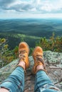 Hiking Adventure Panorama Close Up of Feet with Hiking Shoes from a Young Woman Resting on Top of a High Hill or Rock, Landscape