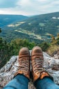 Hiking Adventure Panorama Close Up of Feet with Hiking Shoes from a Young Woman Resting on Top of a High Hill or Rock, Landscape