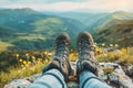 Hiking Adventure Panorama Close Up of Feet with Hiking Shoes from a Young Woman Resting on Top of a High Hill or Rock, Landscape