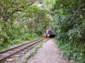 Hiking along the train tracks of Peru Rail on the road to Aguas