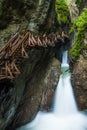 Hiking along a woodend boardwalk in a canyon near Kaprun, Austria Royalty Free Stock Photo