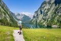 Hiking in the alps near Berchtesgaden at the Obersee, Koenigssee