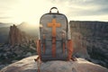 Hiking backpack on the top of a mountain. Travel and adventure concept. Missionary work