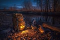 hiking backpack beside a warm campfire at night