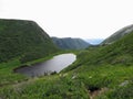 Hiking in beautiful Gros Morne National Park atop Gros Morne Mountain in Newfoundland and Labrador, Canada Royalty Free Stock Photo