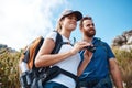Hiking, binoculars and love with a couple on a mountain, enjoying a view while walking out in nature together. Summer Royalty Free Stock Photo