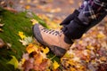 Hiking boot in autumn leaves Royalty Free Stock Photo