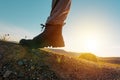 Hiking boot on rocky mountain terrain, man walking outdoor in nature Royalty Free Stock Photo