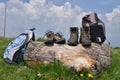 Hiking boots, backpacks, cloudy sky Royalty Free Stock Photo