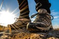 Hiking boots close-up. Tourist walking on the trail.