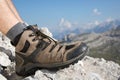 Hiking boots of a hiker in the mountains Royalty Free Stock Photo