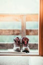 Hiking boots inside of a rustic mountain chalet, Austria