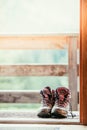 Hiking boots inside of a rustic mountain chalet, Austria Royalty Free Stock Photo