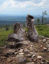 Hiking boots walking on wilderness path background Royalty Free Stock Photo