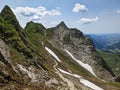 Hiking on the breathtaking Hardergrat in the Bernese Alps. Extremely dangerous path on the mountain ridge Royalty Free Stock Photo