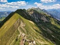 Hiking on the breathtaking Hardergrat in the Bernese Alps. Extremely dangerous path on the mountain ridge Royalty Free Stock Photo