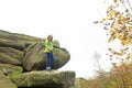 Hiking and climbing, at Brimham Rocks, in Autumn.